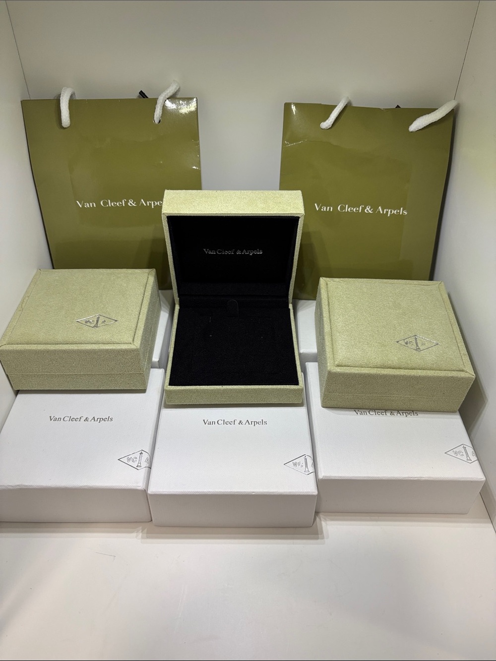 Van Cleef & Arpels Authentic luxury green velvet jewelry or storage box.